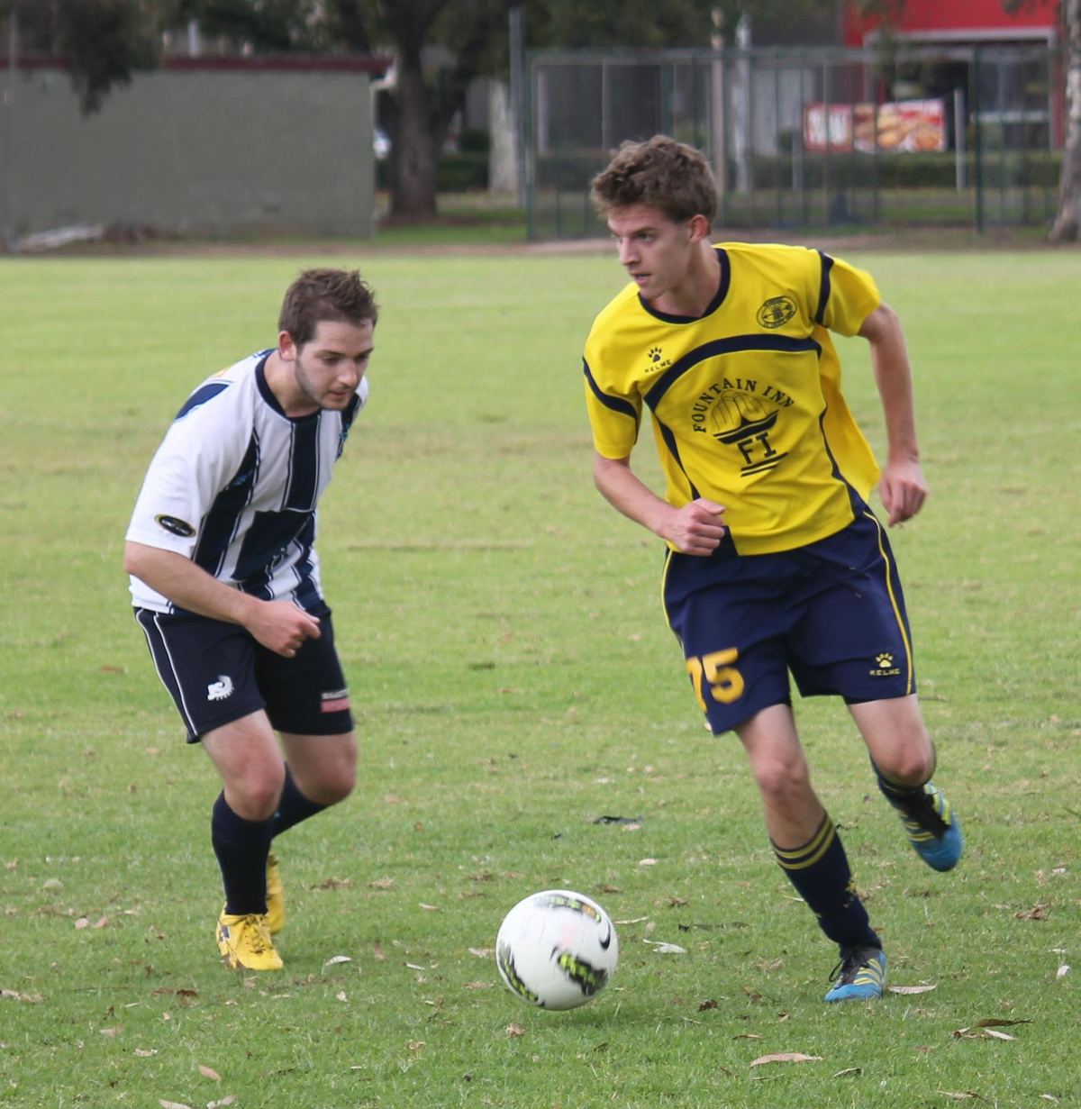 Zak dribbling past an opponent